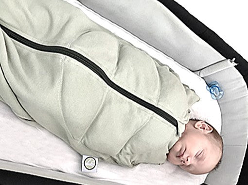 Swaddle your baby for better sleep - but be wary!