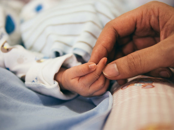 How to Transition Out of a Swaddle: Gentle Methods and Best Practices Photo by Aditya Romansa on Unsplash