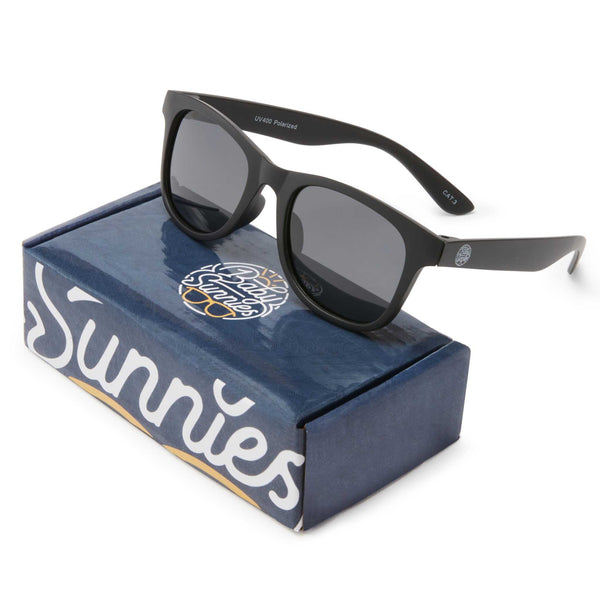 Black flexible polarized kids sunglasses for ages 3-8, UV400 protection, durable, eco-friendly.