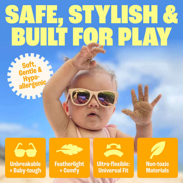 Transparent Pink Polarized Baby Sunglasses with Strap 0-24 Months on a baby playing in the sand, showcasing UV protection and comfort.